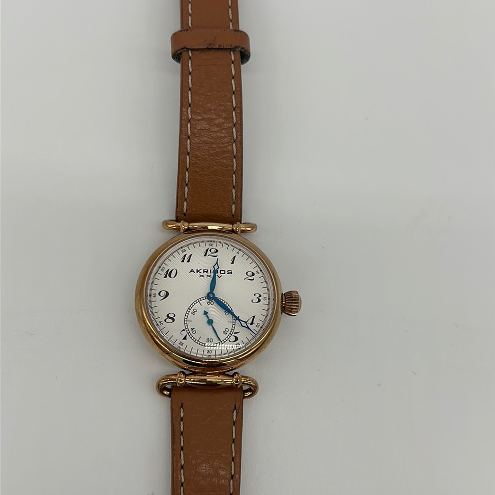 Akribos XXIV leather and rose gold watch. Classic.